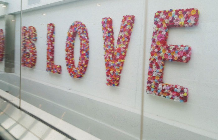 The word 'Love' spelled out in flowers